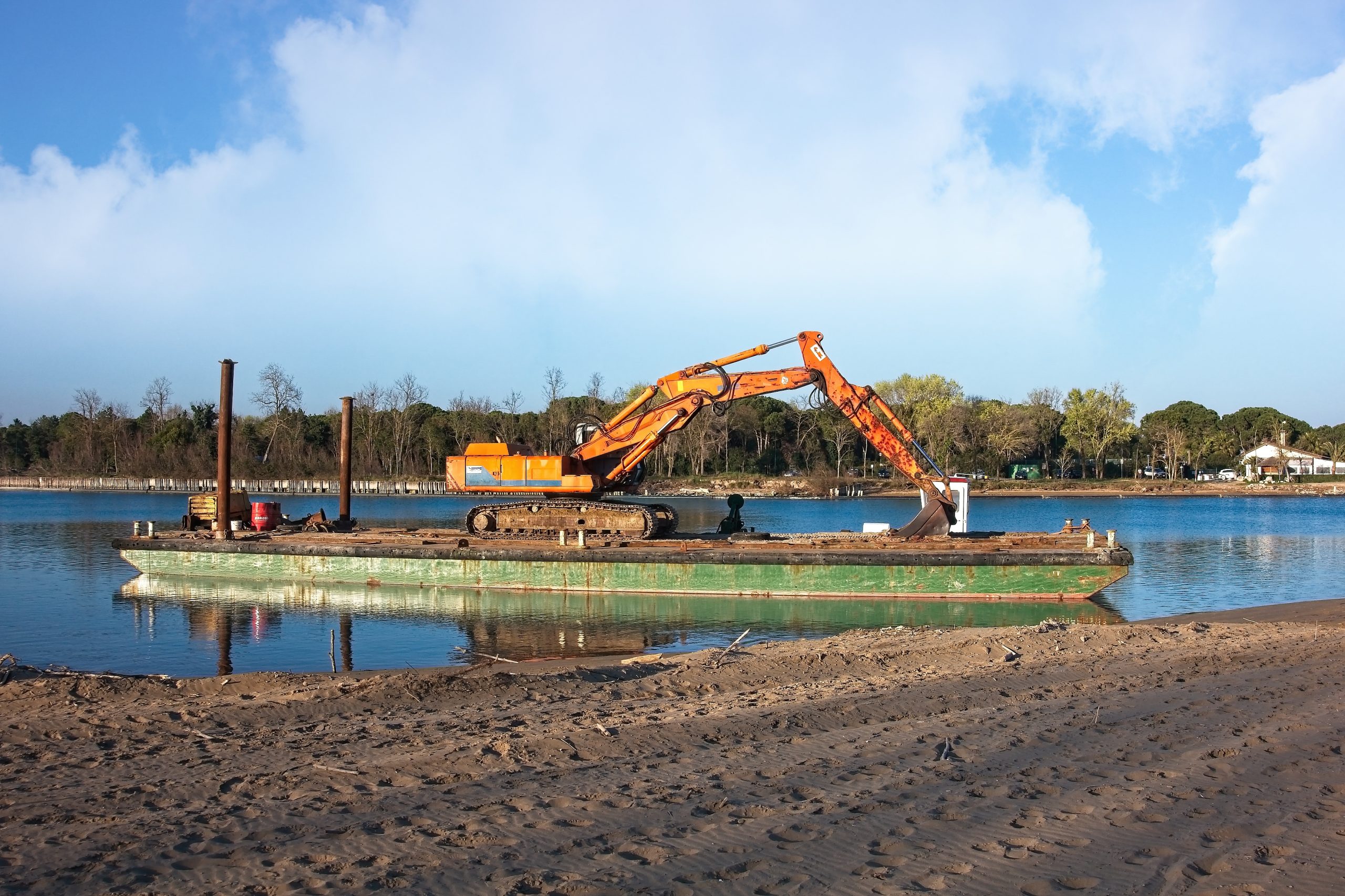 excavator for channel dredge on a barge 2025 01 07 23 14 47 utc scaled | JRMC Inc